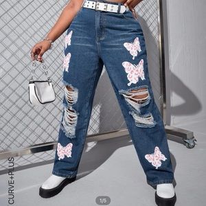 Ripped butterfly jeans